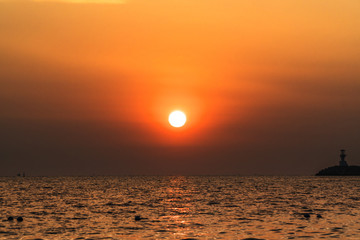 The sun is go down to the sea. Landscapes. Seascapes.