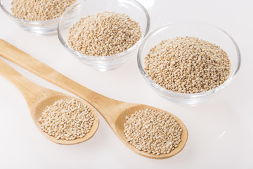 Quinoa grains in bowl isolated on white background, Chenopodium quinoa