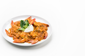 Curry-fried shrimps isolated on a white background. Thai food. Copy space. For design. Thai food concept.