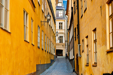 Fototapeta na wymiar Beautiful narrow street in Stockholm. Sweden
