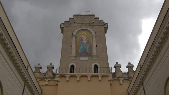 Virgin Mary mural on the tower 