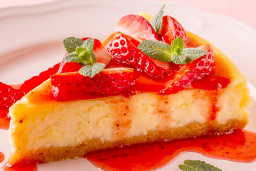 Delicious homemade cheesecake with strawberries.