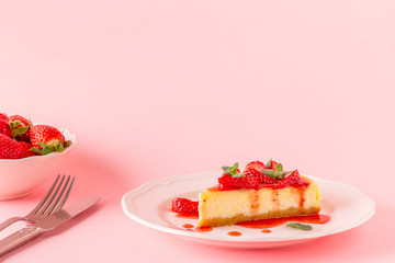 Delicious homemade cheesecake with strawberries.