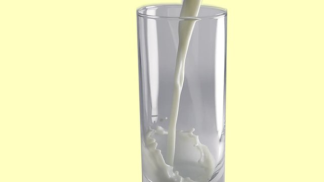 Pouring milk in long stream into a glass