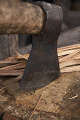 axe stuck in a stump