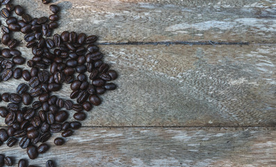 Flat lay coffee beans on vintage wooden table top
