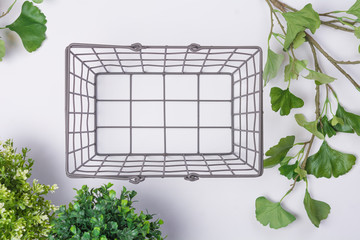 Wire Metal Basket with Foliage Flat Lay Top View
