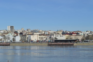 Fototapeta na wymiar City panorama from river bank