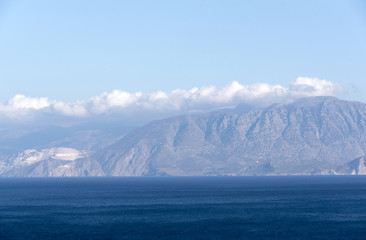 Fototapeta na wymiar Gulf of Mirabello and mountains off the Cretan town of Agios Nikolaos, Crete, Greece, 2017