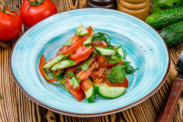Vegetable salad with tomatoes and cucumbers
