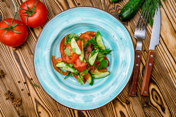 Vegetable salad with tomatoes and cucumbers