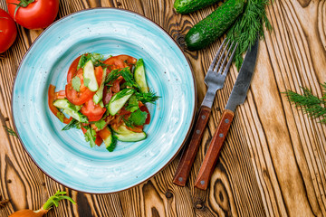 Vegetable salad with tomatoes and cucumbers