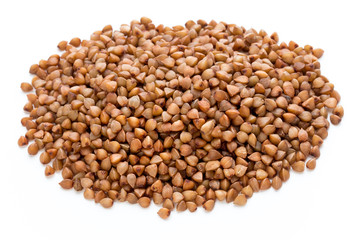 Buckwheat grains isolated on the white background.