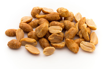 Peeled peanuts on the isolated background.
