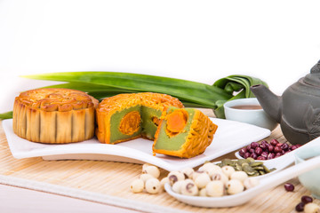 Mid-Autumn festival Chinese mooncake  with ingredients and tea