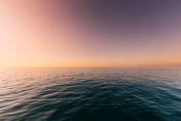 Sea Or Ocean And Colorful Sunset Or Sunrise Sky Background