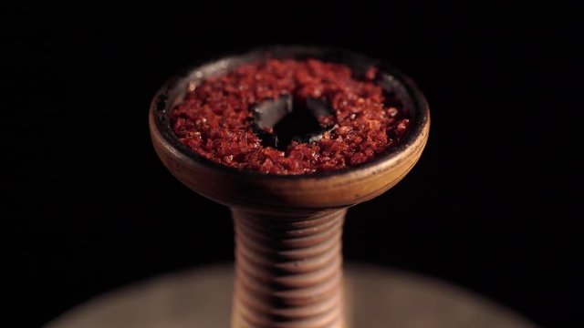 Red tobacco in hookah shisha bowl
