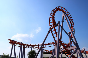 roller coaster with blue sky