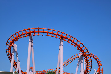 roller coaster with blue sky