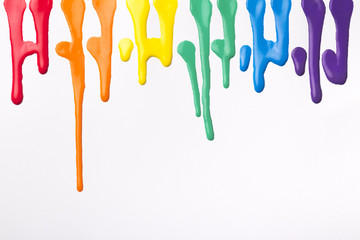 painted abstract background,flowing multicolored paint on white