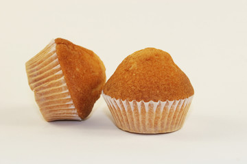 Chocolate muffin closeup on white background