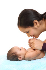 Cheerful mother holding newborn baby - 200669249