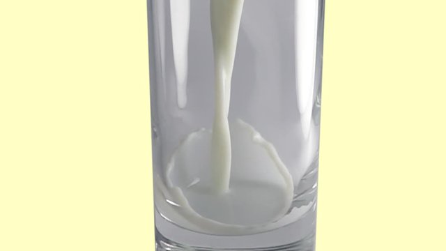 Pouring milk in into a glass