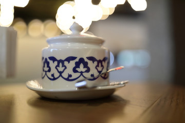 Sugar bowl on table