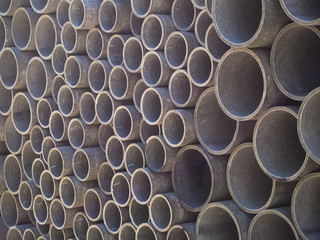 Asbestos cement pipes used for drainage construction. Texture for background.
