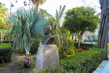 park with palms, flowers, fruits, oranges and monuments at Cadiz, Spain, Andalusia, Campo del Sur