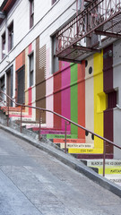 Angle view of the Vinton Court Steps installation, mural by Erin Jang, known as Chinatown Flavor, part of The Color Factory pop-up, Chinatown, San Francisco, California, USA