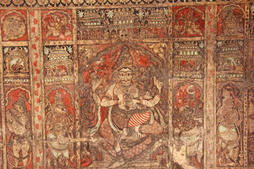 Frescoes and ancient drawings paintings and scenes on the ceiling in Shiva Virupaksha Temple....