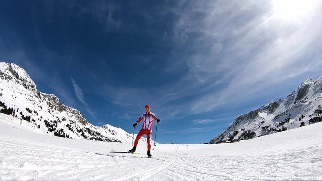 slow motion cross country skier low perspective
