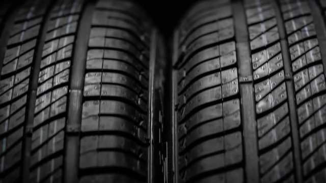 New and unused car tires spinning