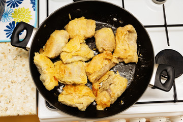 Fried in margarine in a frying pan stuffed with meat and cabbage.