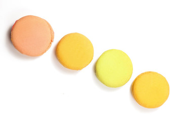 Delicious four multicolored macaroon isolated on white background