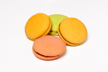 Delicious four multicolored macaroon isolated on white background