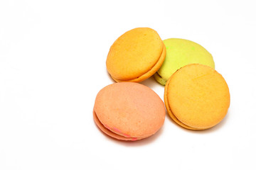 Delicious four multicolored macaroon isolated on white background