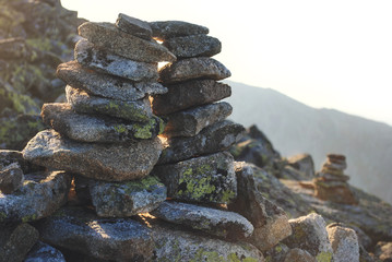 Closeup of a Stack of Stones on Top of a Mountain