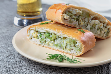 sliced pie with filling lies on the plate