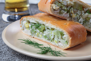 sliced pie with filling lies on the plate