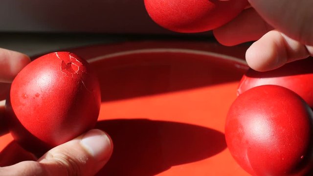 Cracking Red Eggs For Easter Christian Tradition