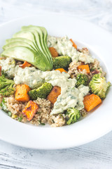 Quinoa salad with roasted vegetables and fresh avocado