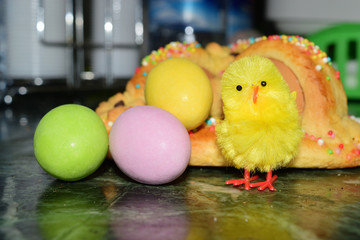 chocolate eggs of various colors with decorations