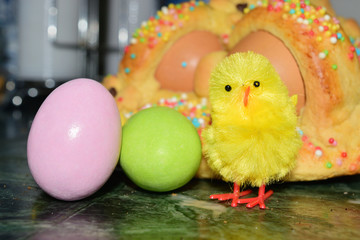 chocolate eggs of various colors with decorations