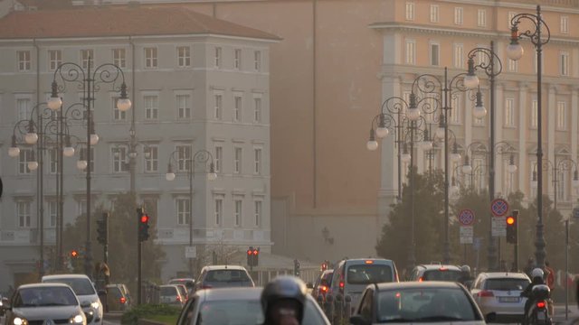 Cars waiting at red lights in Trieste