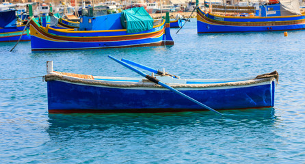 Small fishing boat at the port of Marsaxlokk, Malta. Closeup view