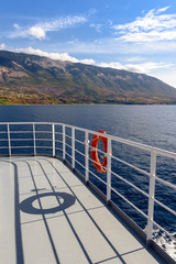 Obraz premium Open deck of a cruise ship in sunny summer day. Greece