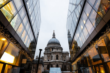 Fototapeta premium St.Paul’s Cathedral reflected on glass office building in London