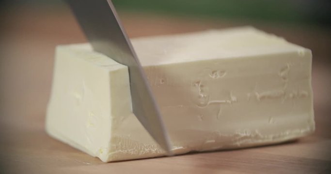 Cutting butter in slow motion